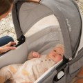 What age can a baby go in a travel cot?